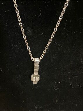 Cookie Lee Silver Knot Drop Necklace.